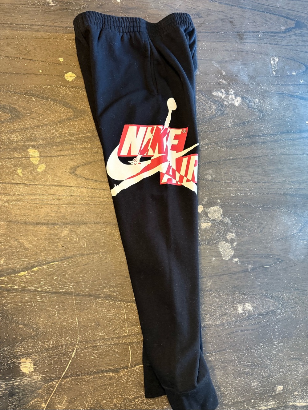 Nike Air Jordan Jumpman Kids' Black Jogger Sweatpants with White & Red Logo